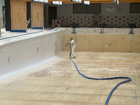 Préparation support béton piscine municipale